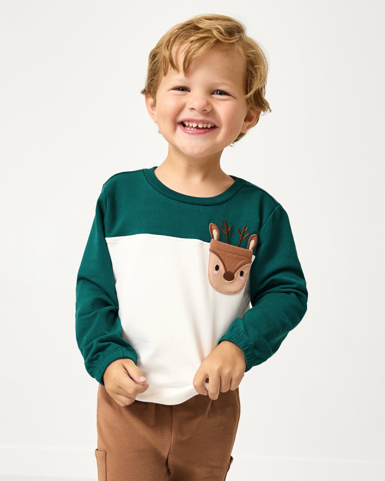 Boy wearing the Reindeer Cinched Pocket Sweatshirt
