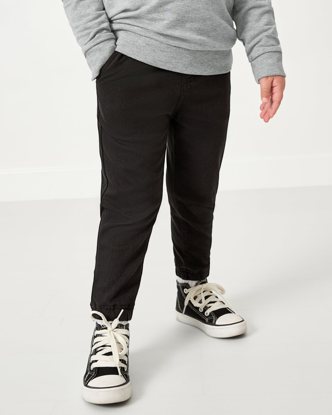 Boy wearing the Black Denim Jogger