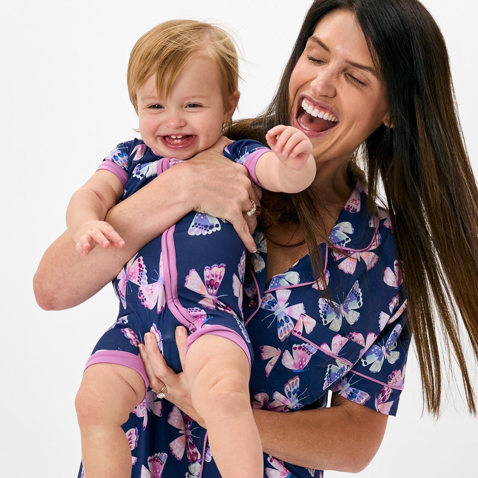 Mother and daughter wearing matching Royal Butterflies butterfly themed bamboo pjs