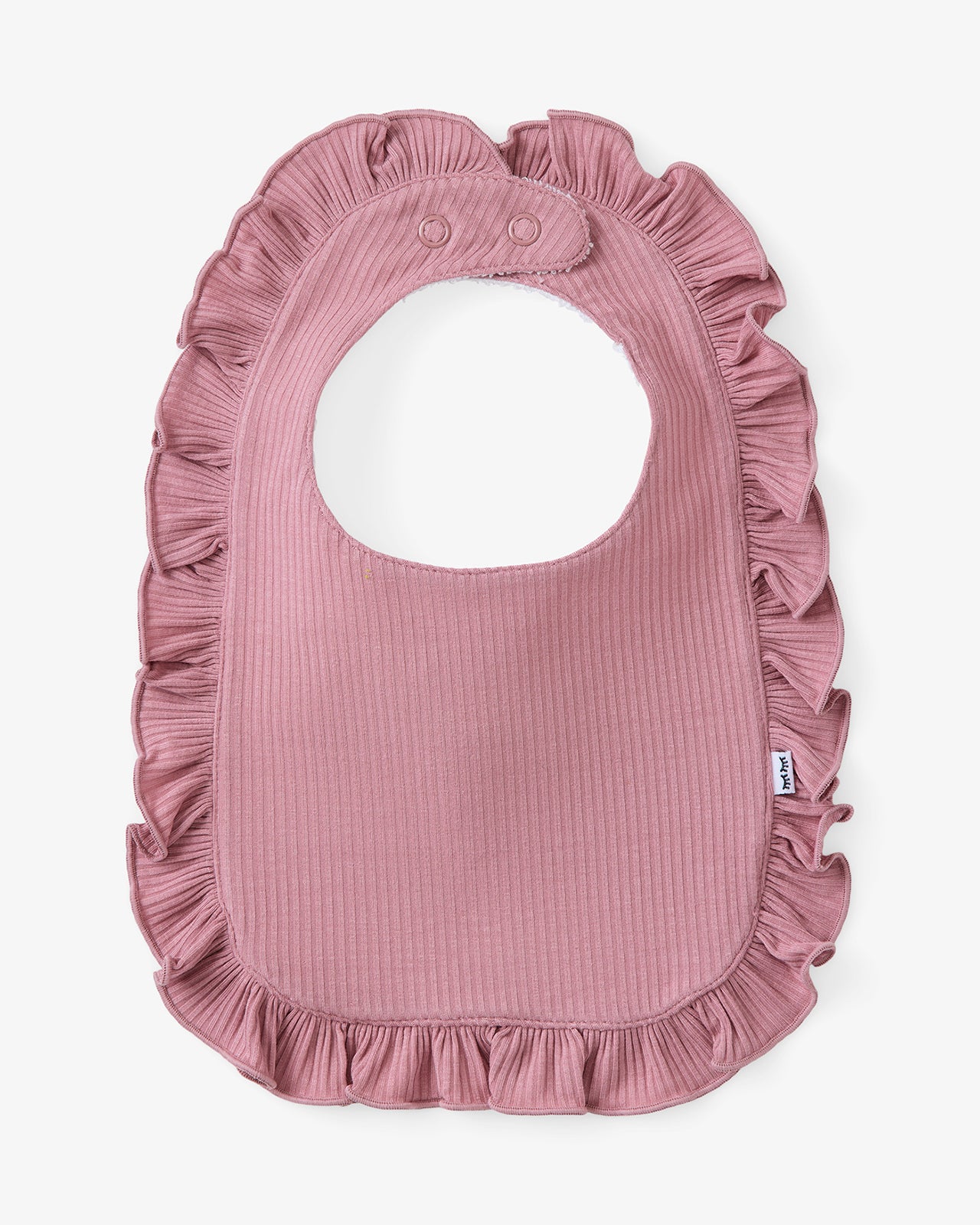 Flat lay of the Rosewood Ribbed Ruffle Bib