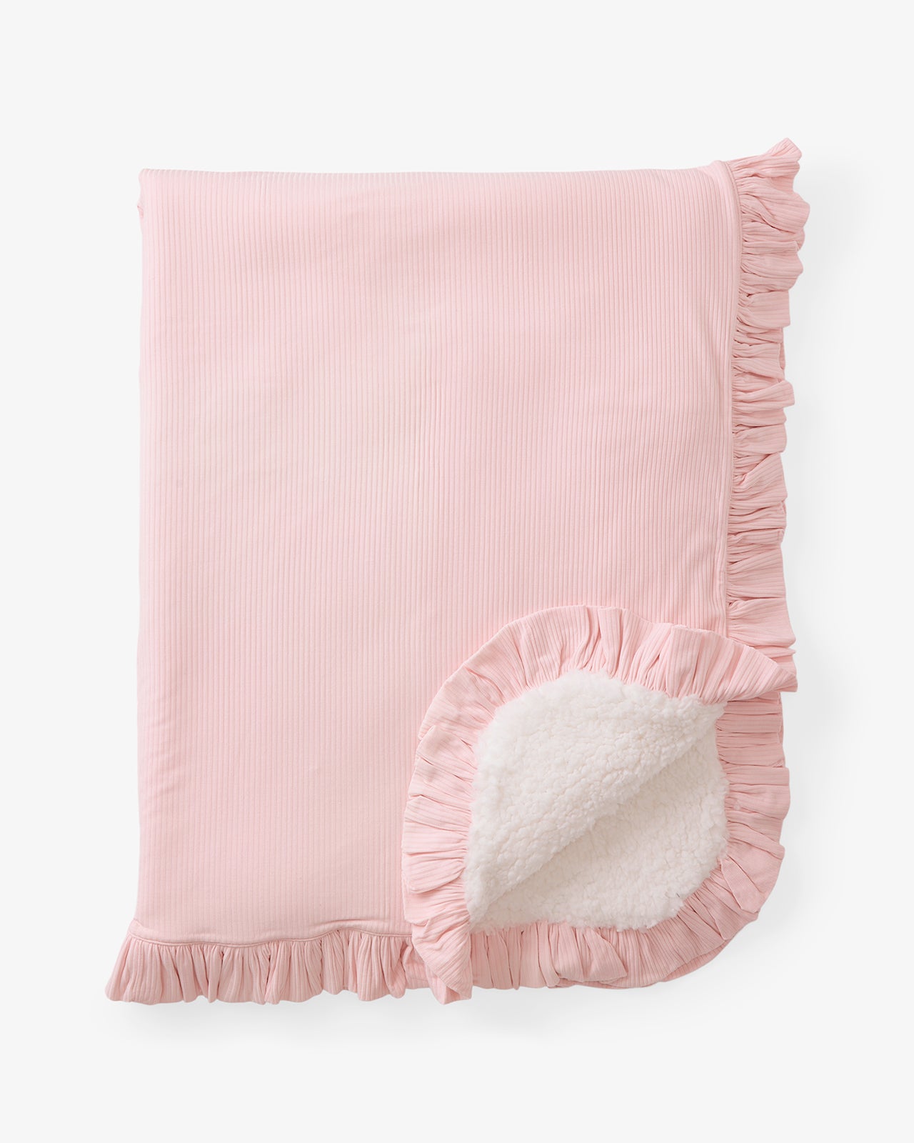 Flat lay of the Prima Pink Ribbed Ruffle Mini Cloud Blanket