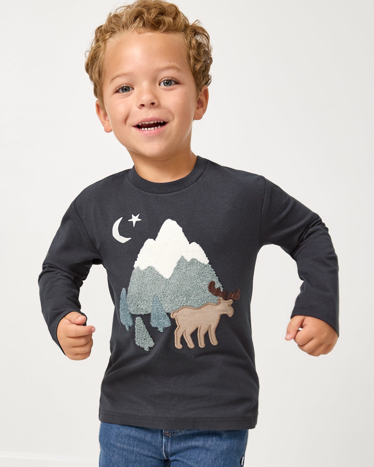 Boy wearing the Moose Trail Long Sleeve Relaxed Tee