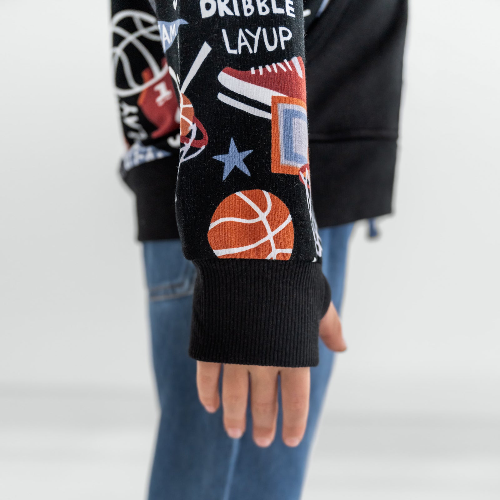 Close up of the wrist cuff on the Black Slam Dunk zip hoodie
