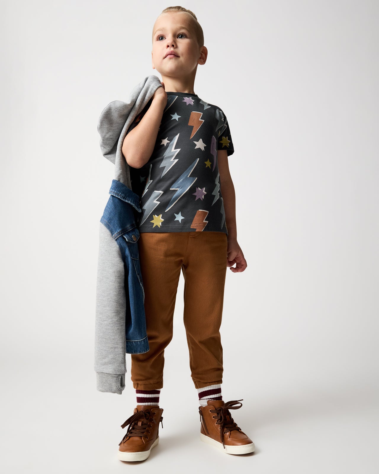 Boy wearing the Rich Toffee Denim Jogger styles with a relaxed tee