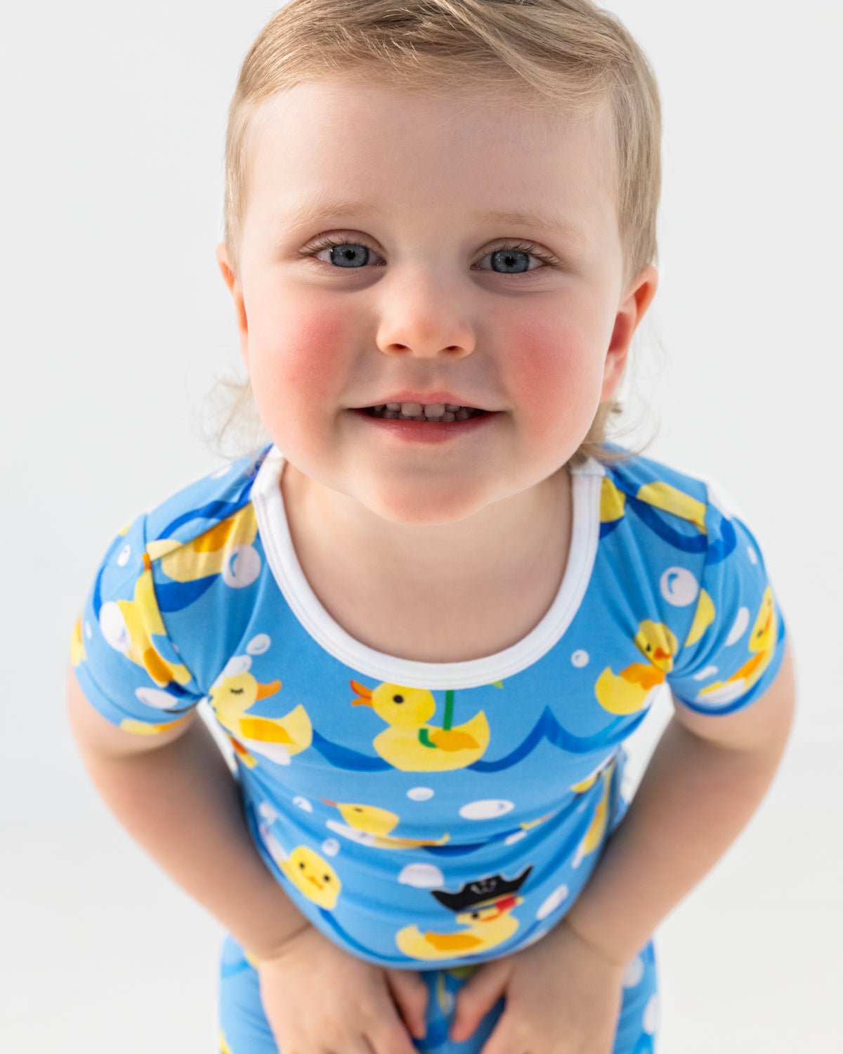 Close up of boy wearing the Splish Splash Two-Piece Bamboo pajamas