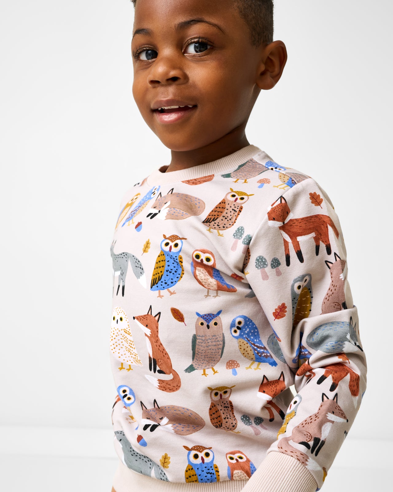 Close up of boy wearing the Twilight Pals Crewneck Sweatshirt