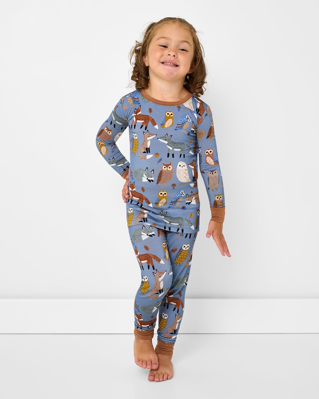 Standing girl wearing the Twilight Pals Two-Piece Pajama Set