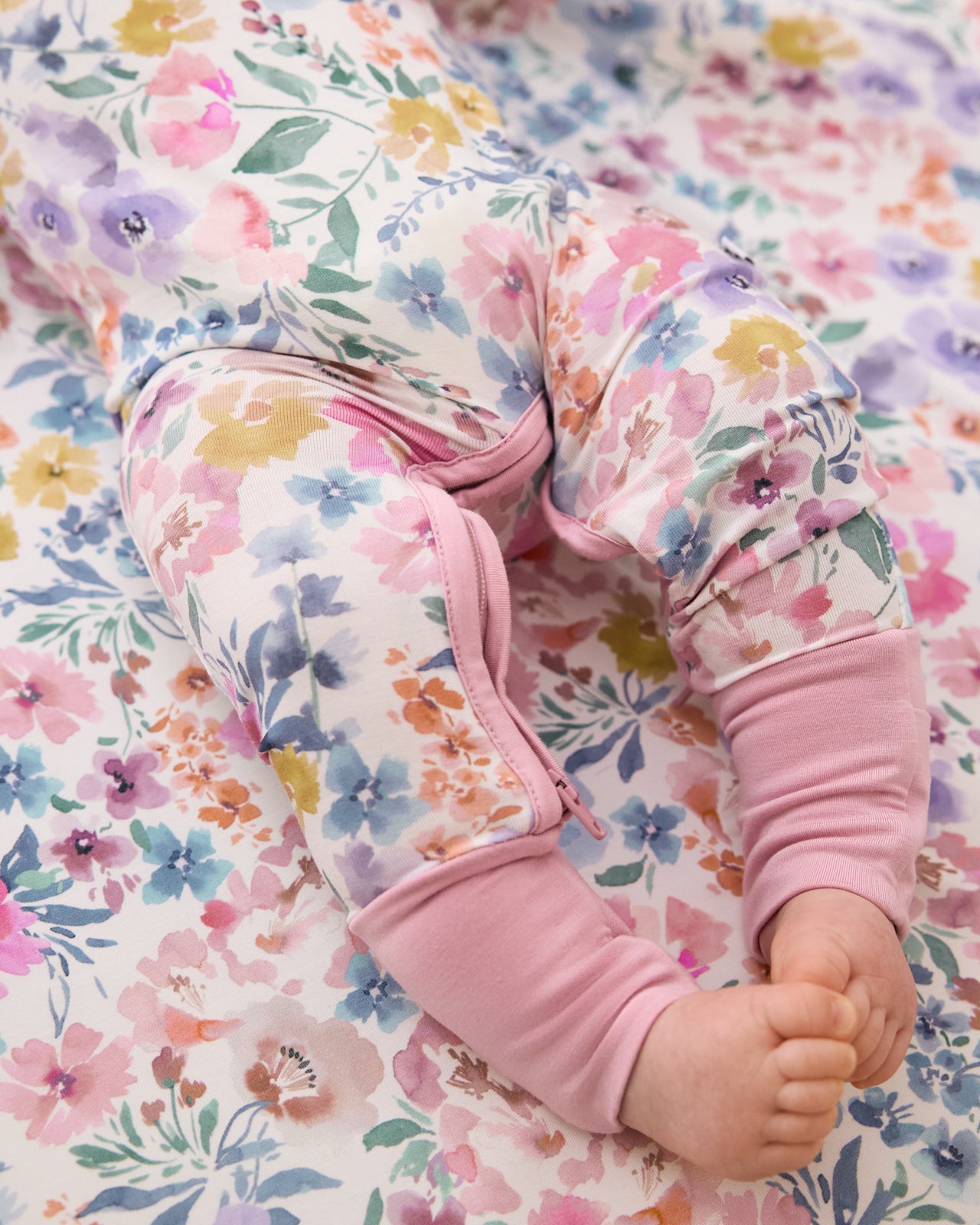 Close up of the crescent zipper on the Tiny Blooms Crescent Zippy