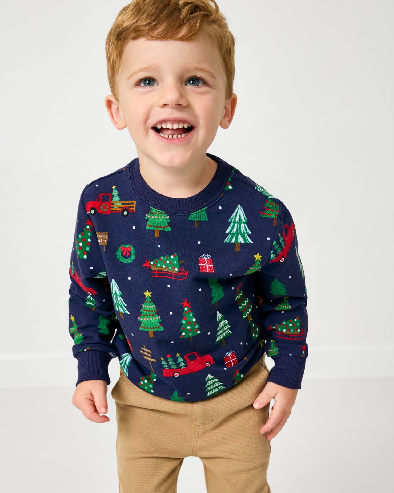 Close up of boy wearing the Navy Tree Traffic Crewneck Sweatshirt