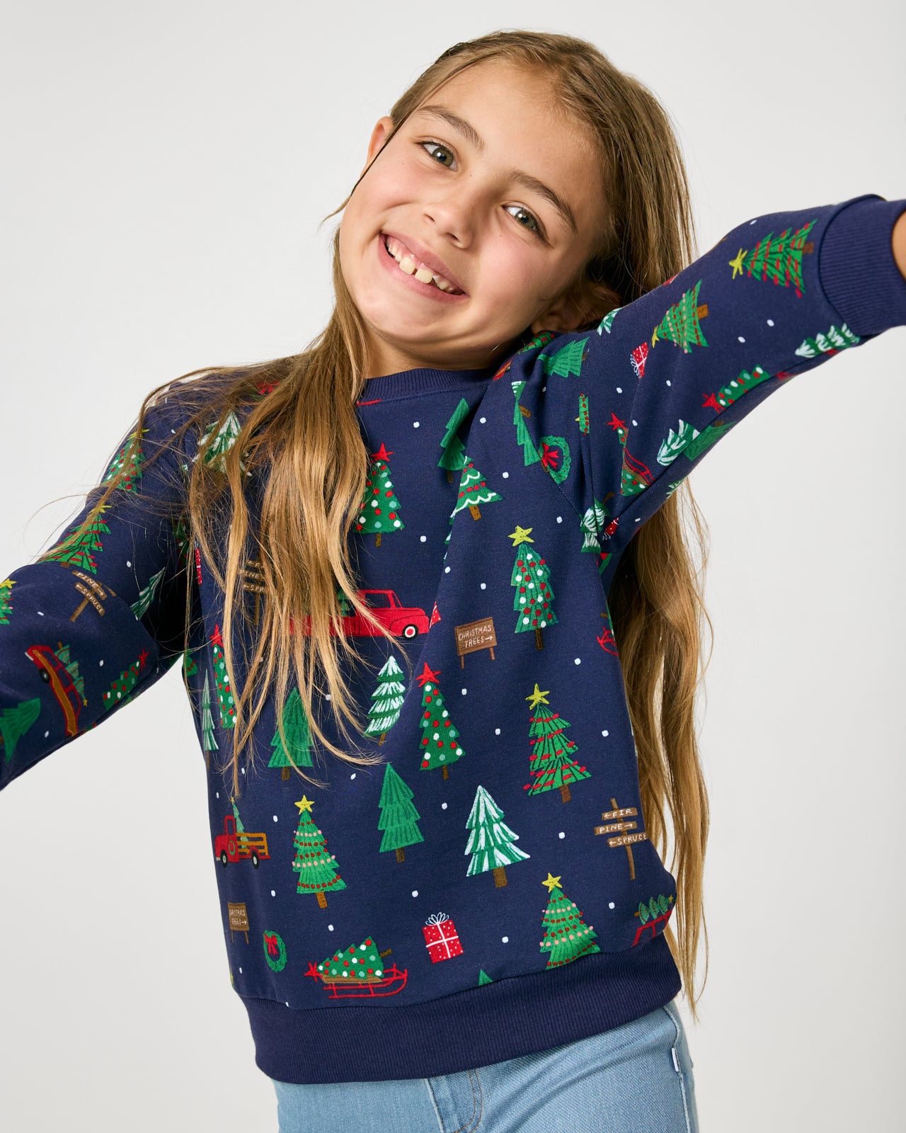 Posing girl wearing the Navy Tree Traffic Crewneck Sweatshirt