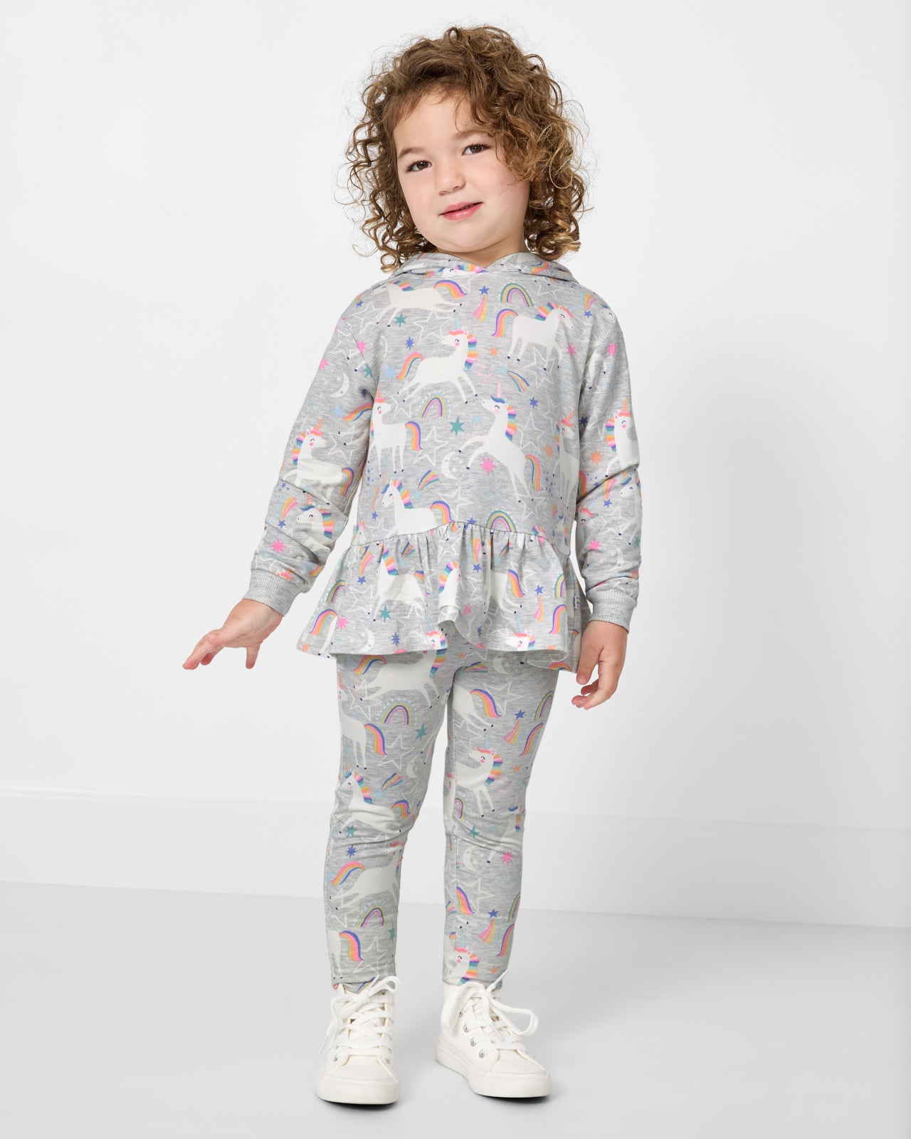 Girl wearing the Unicorn Dance Legging and Hoodie