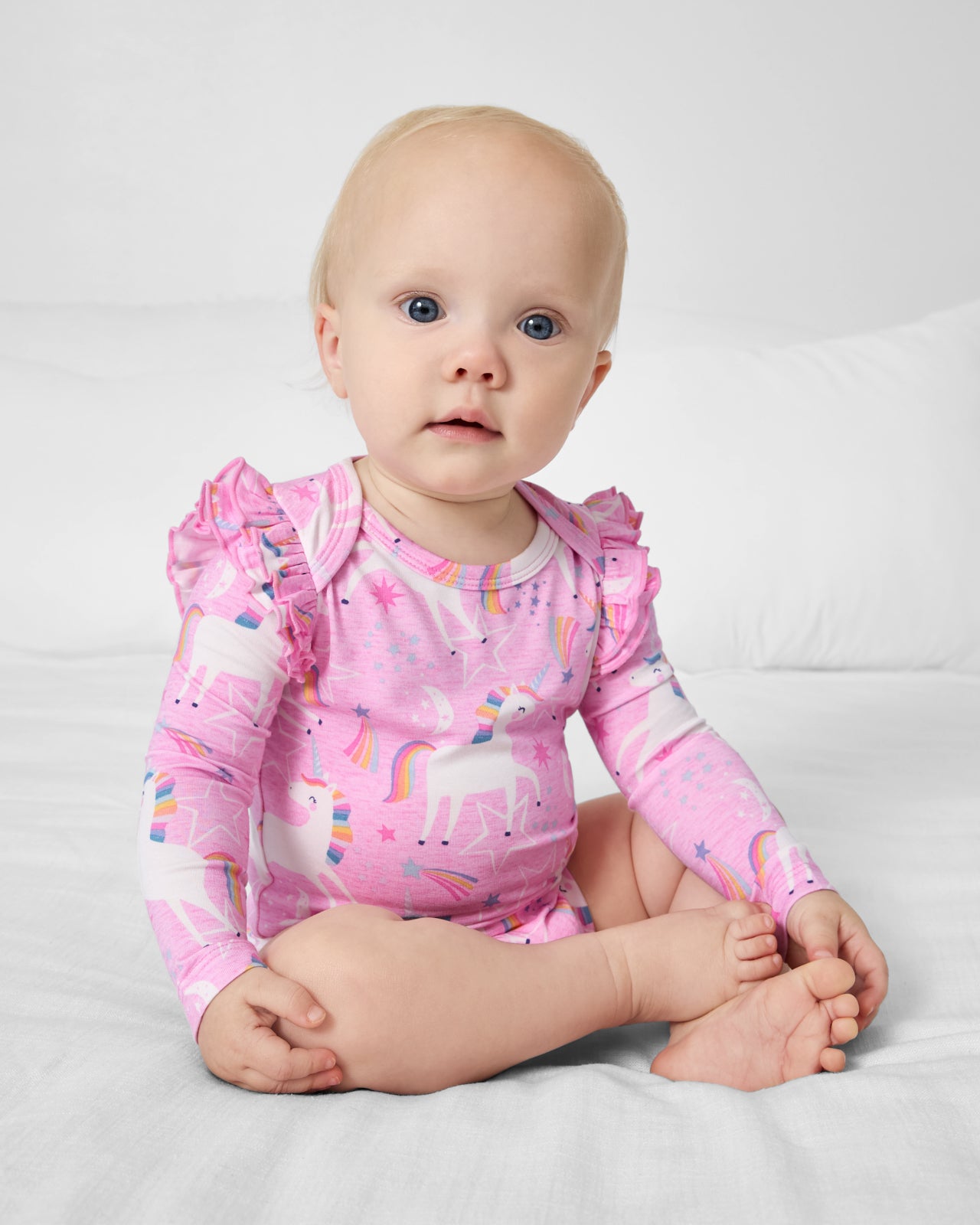 Baby wearing the Unicorn Dance Flutter Bodysuit