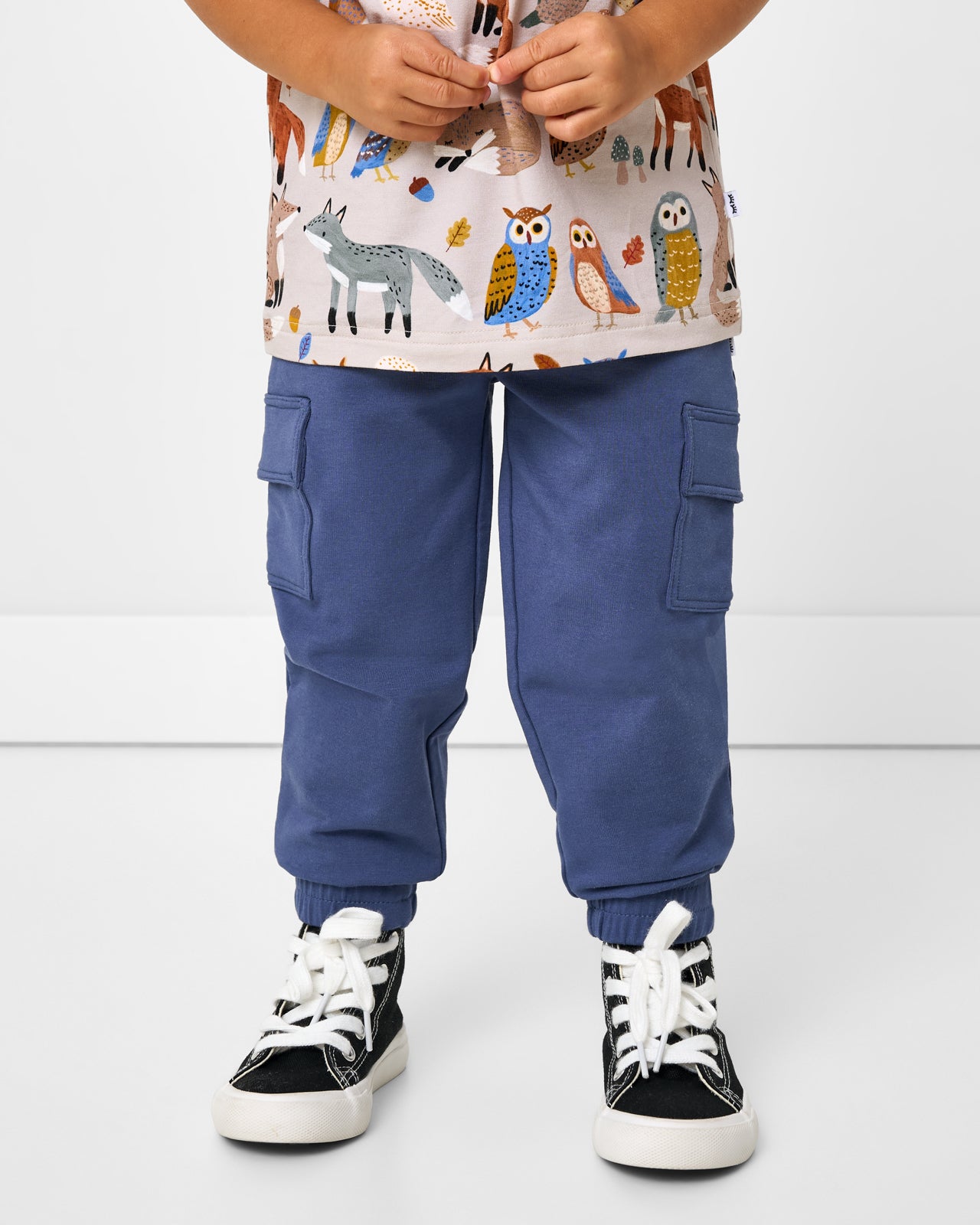 Boy wearing the Vintage Navy Cargo Jogger