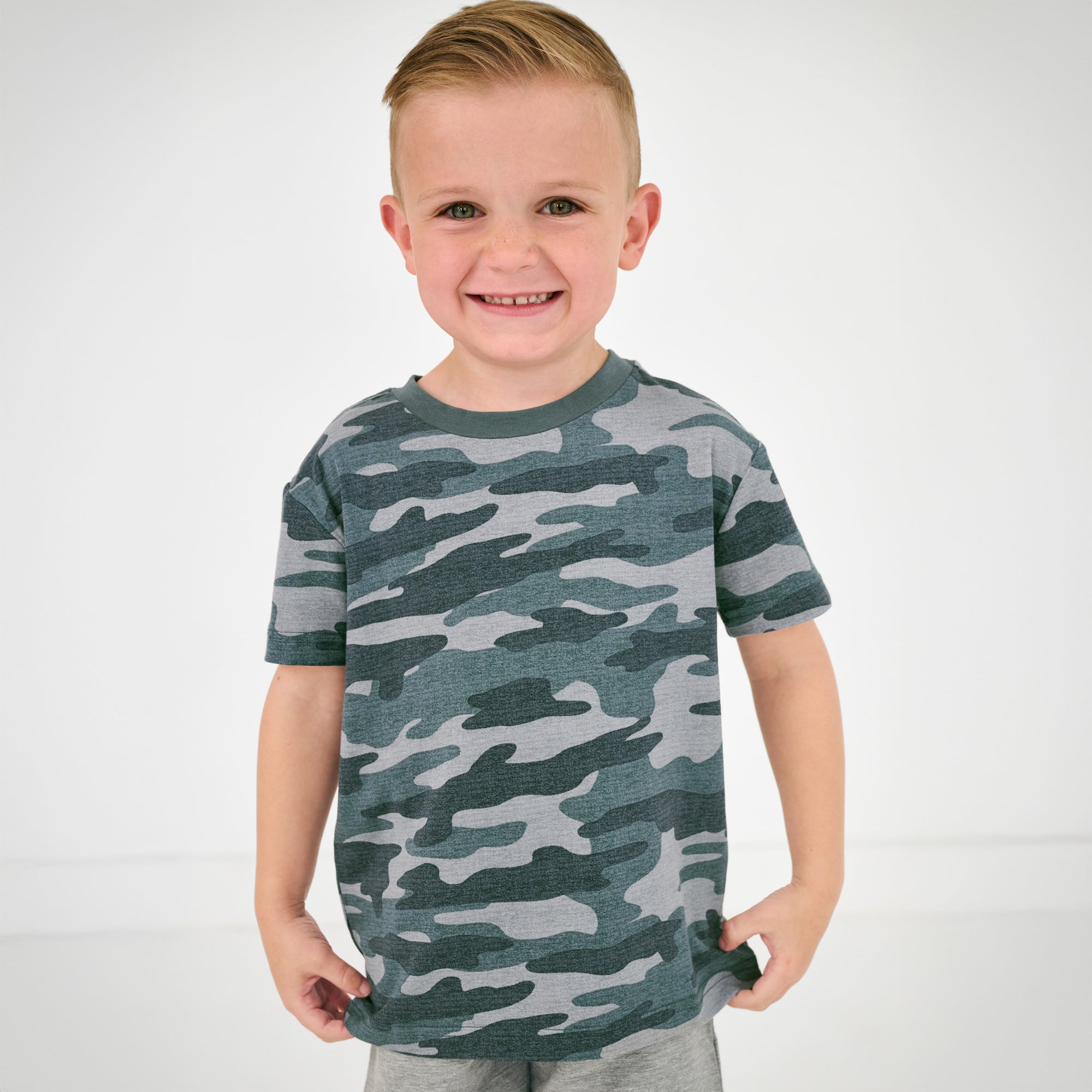 Close up of child wearing the Vintage Camo Short Sleeve Relaxed Tee