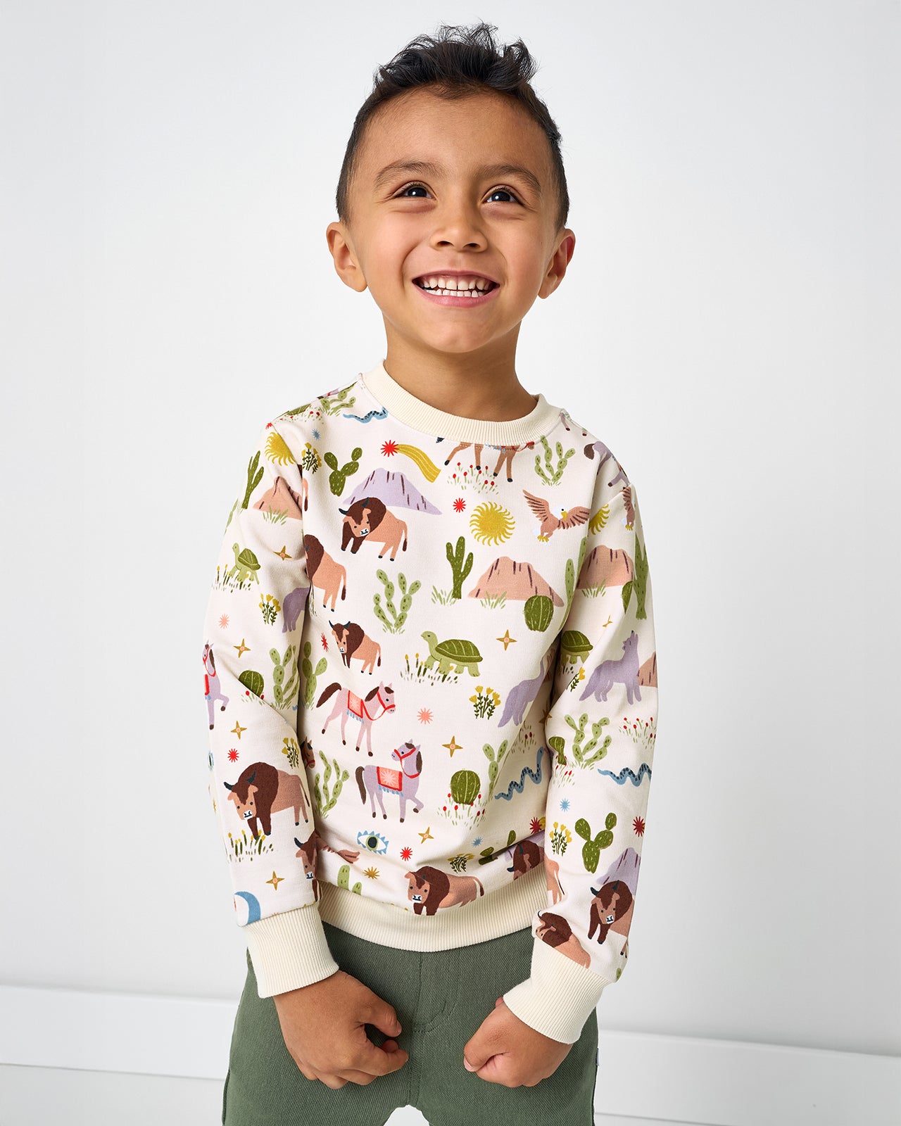Boy wearing the Wild Frontier Crewneck Sweatshirt