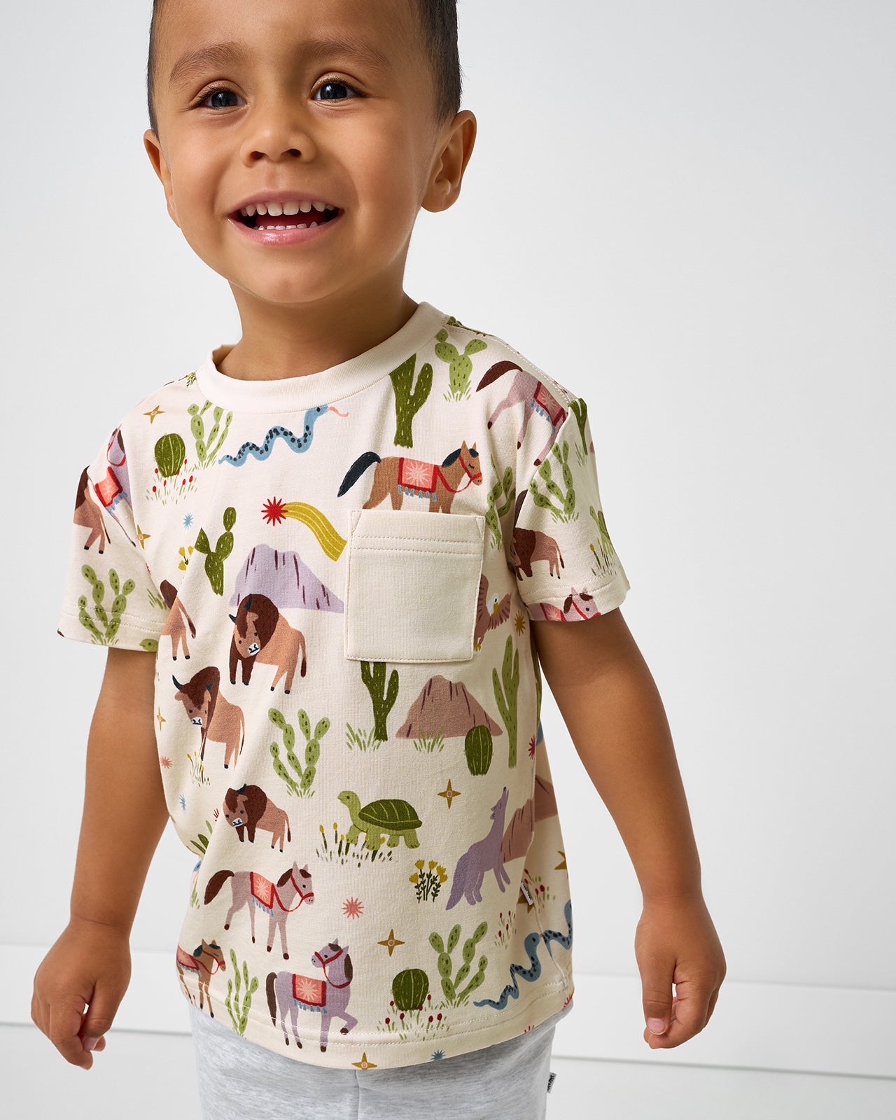 Boy wearing the Wild Frontier Relaxed Pocket Tee