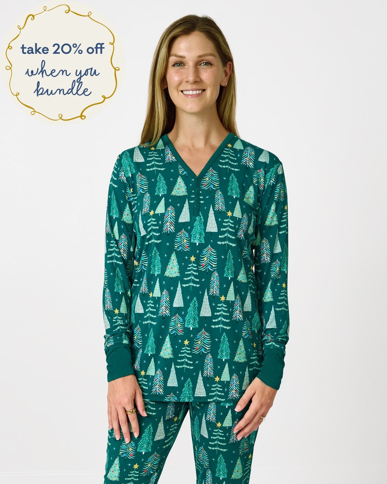 Woman wearing the Twinkling Trees Women's Long Sleeve Pajama Top