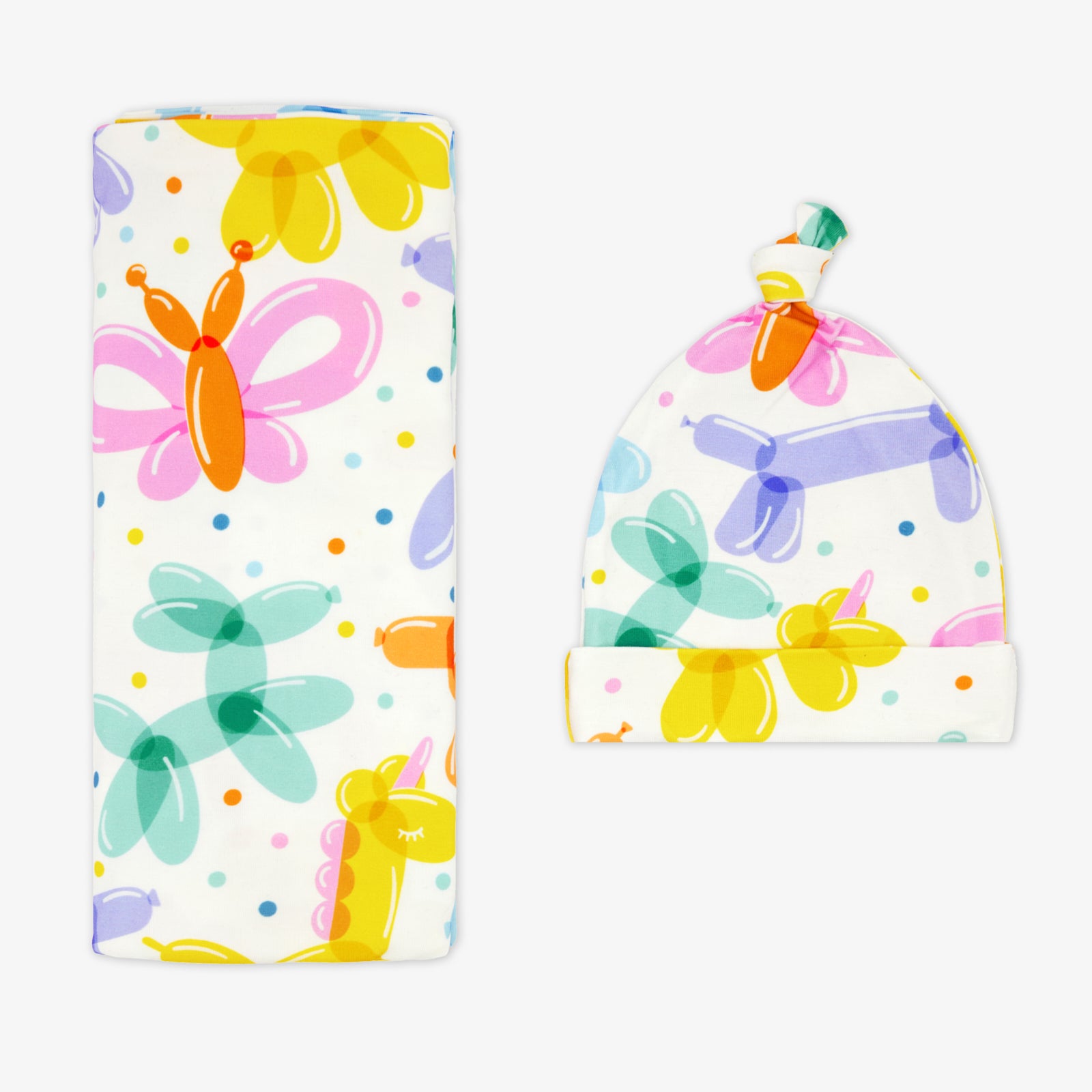 Flat lay of the Balloon Bash Swaddle & Hat Set