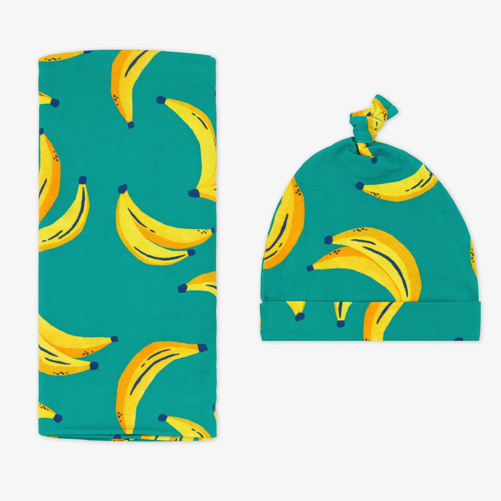 Flat lay of the Go Bananas Swaddle & Hat Set