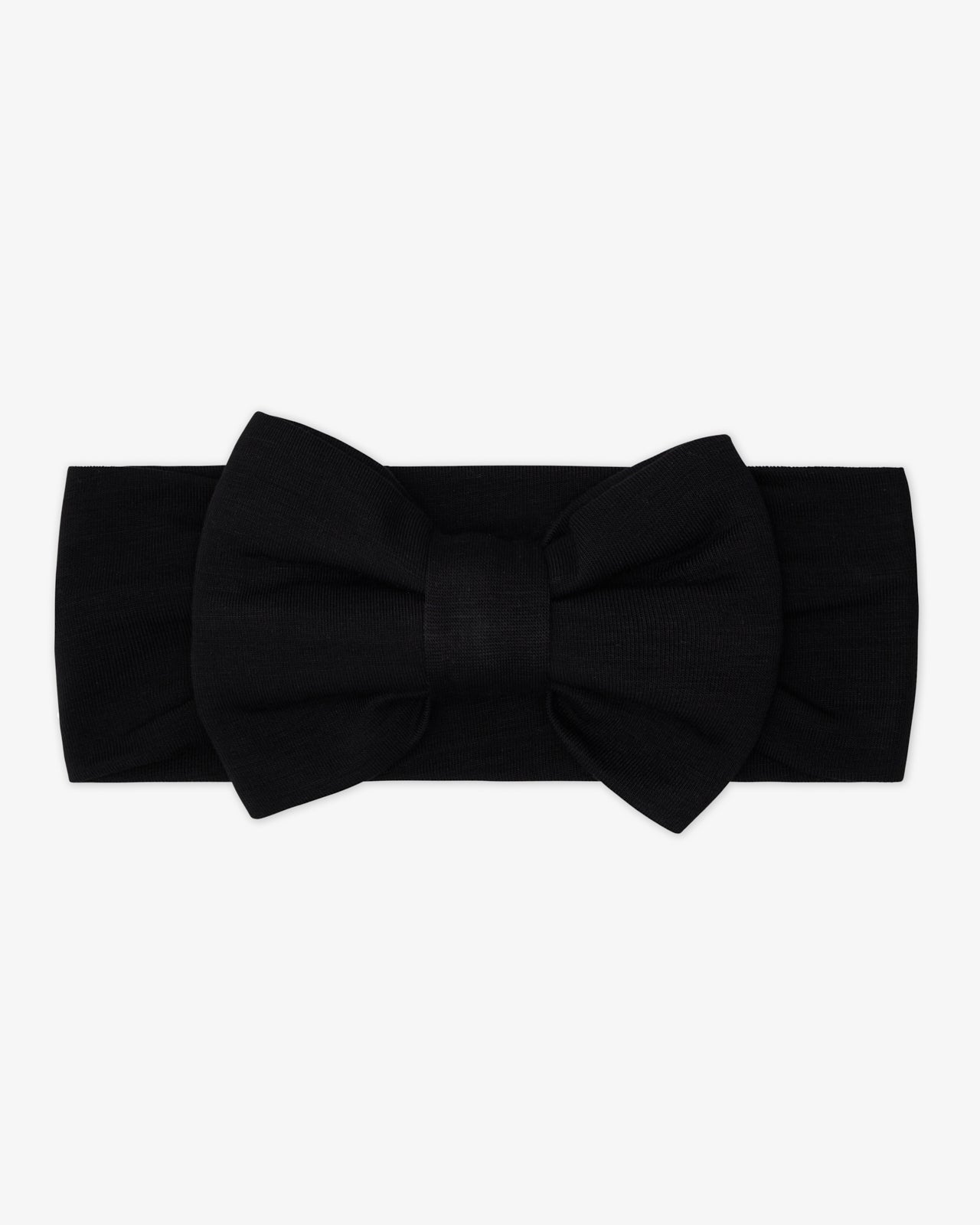 Flat lay of the Black Luxe Bow Headband