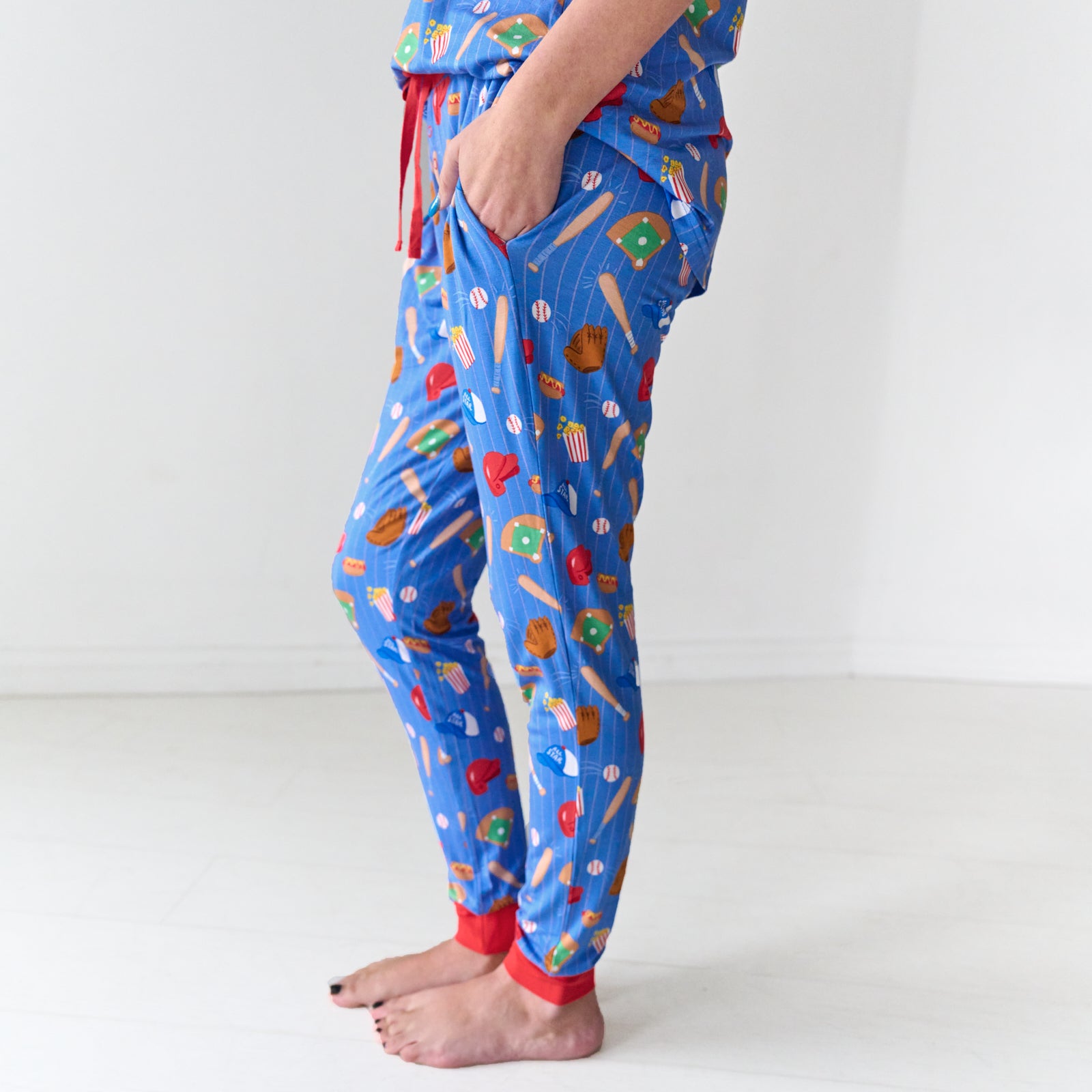 Close up profile view of a woman wearing Blue All Stars women's bamboo pajama pants