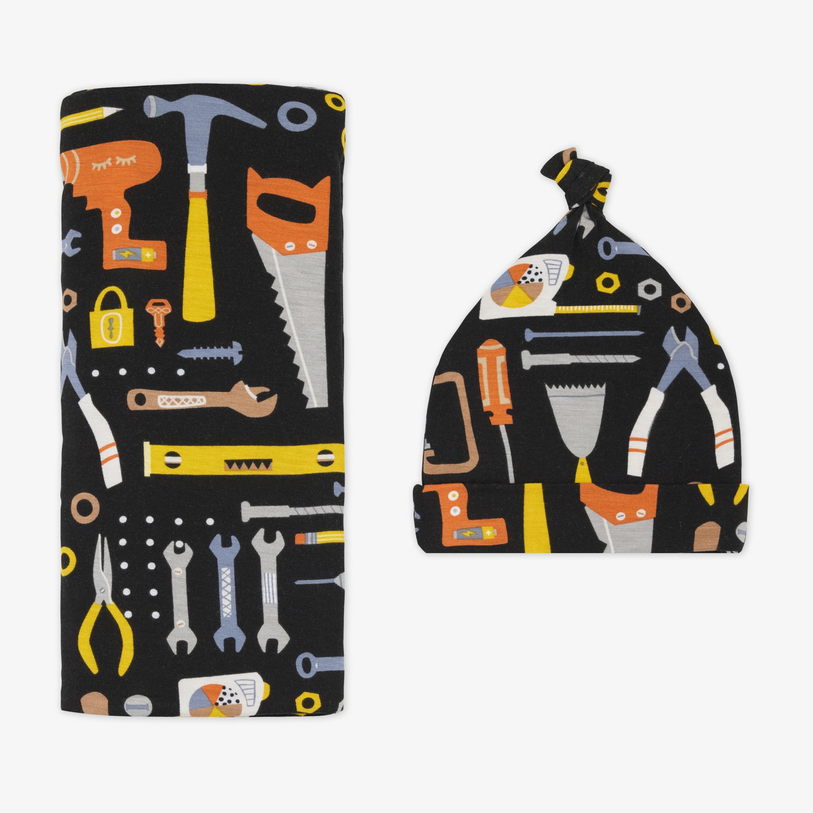 Flat lay of the Little Builders Swaddle & Hat Set