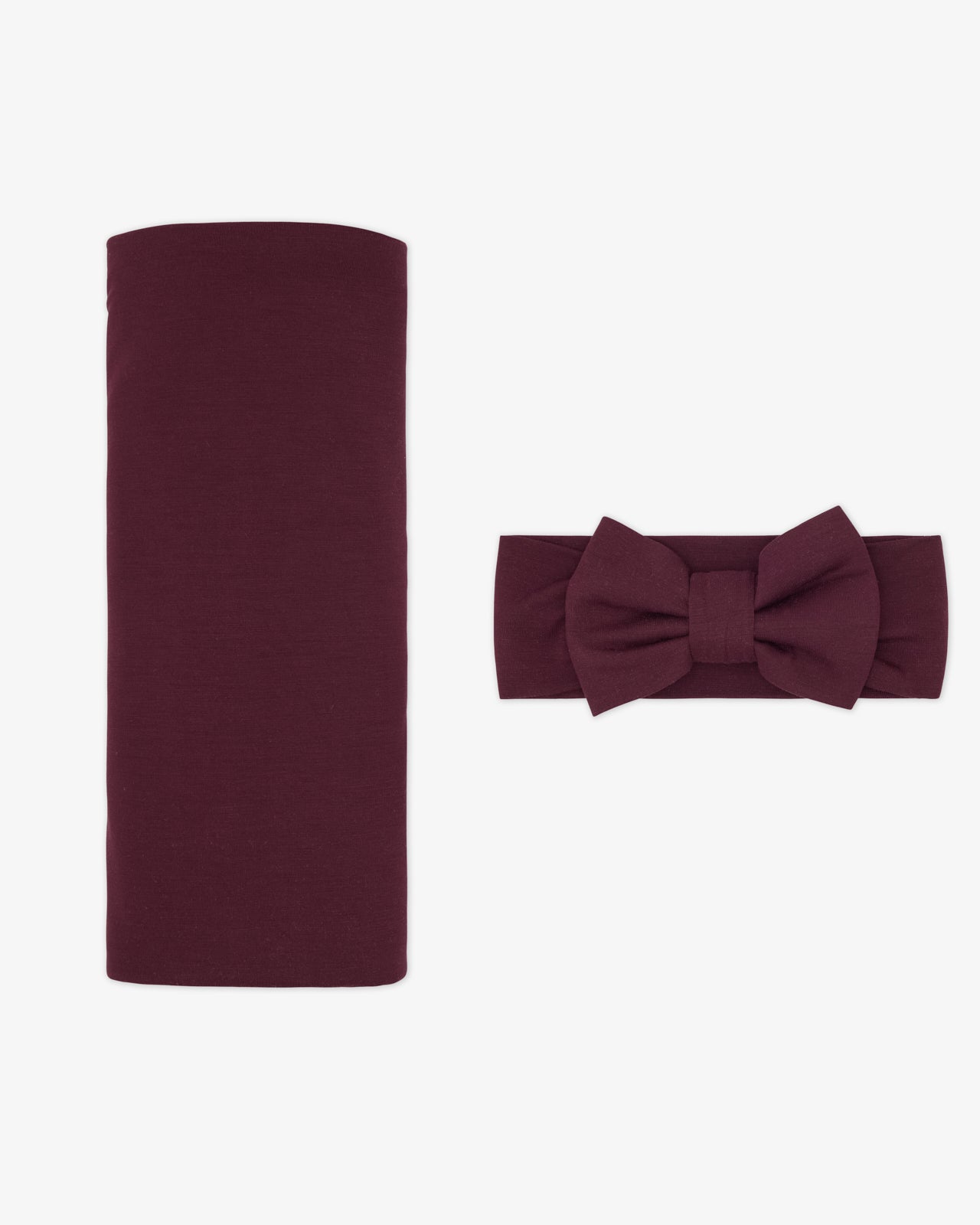 Flat lay of the Classic Burgundy Swaddle & Luxe Bow Headband Set