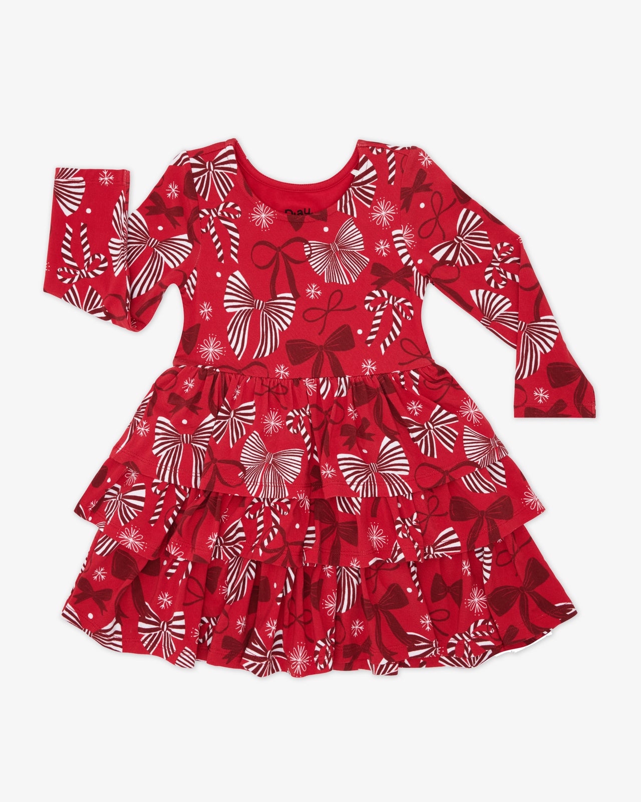 Flat lay of the Holiday Bows Tiered Dress