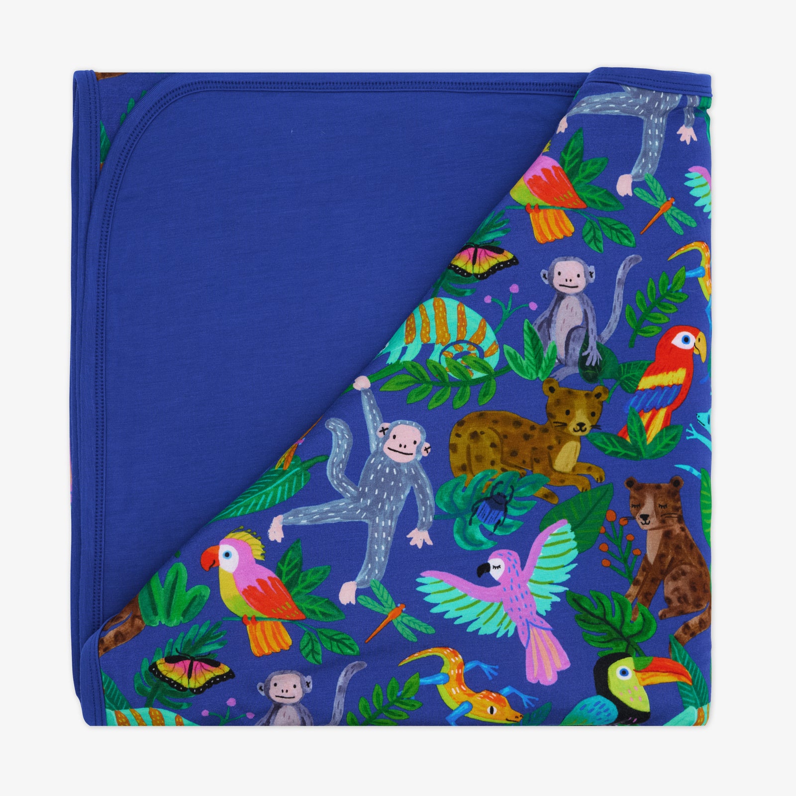 Flat lay of the Treetop Tails Large Cloud Blanket®