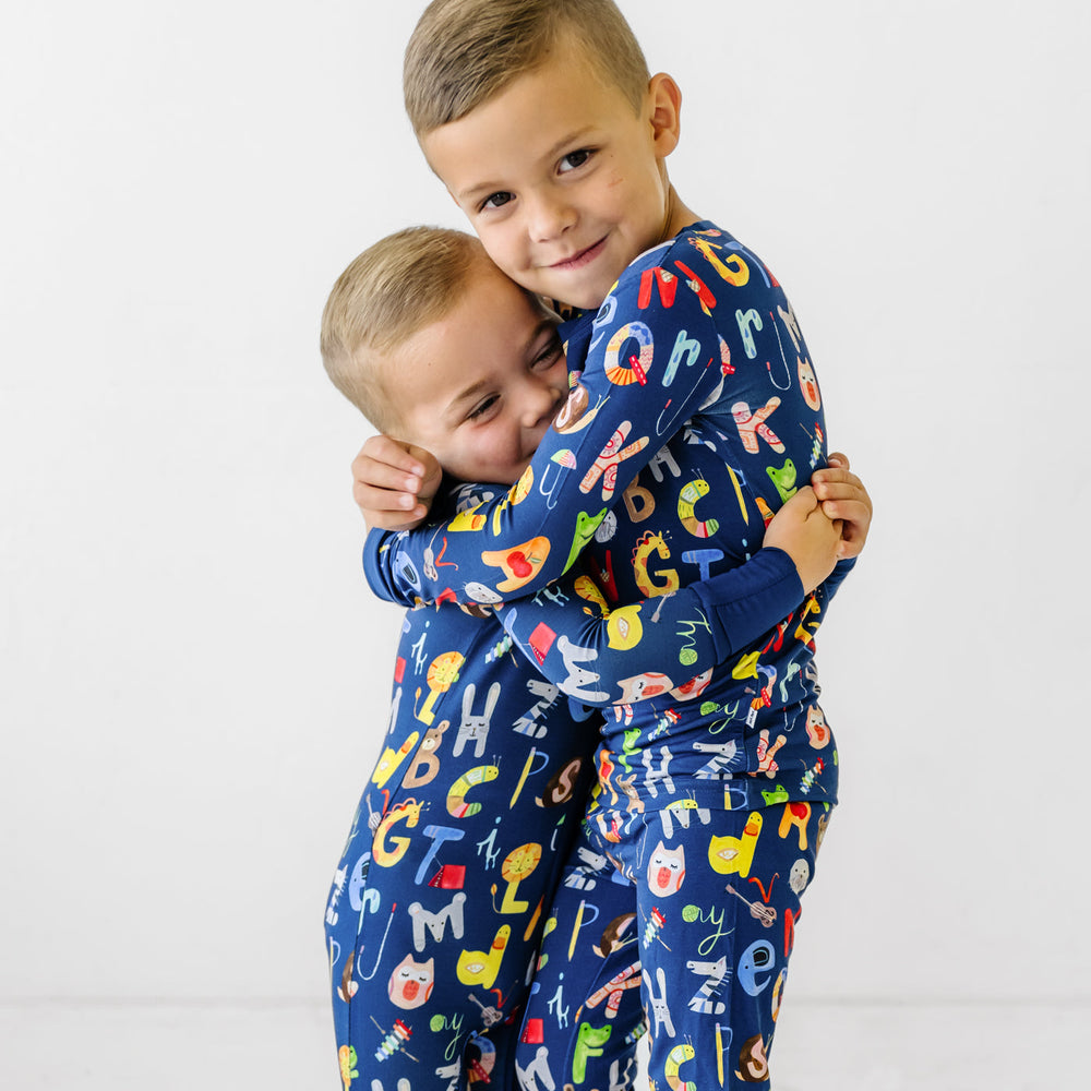 LS/P PJ Set - Navy Alphabet Friends Two-Piece Pajama Set