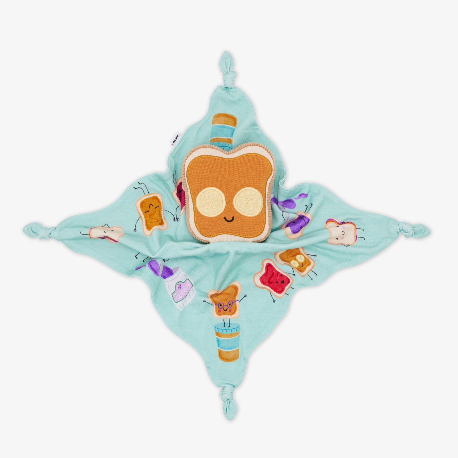 Flat lay of the peanut butter side of the Sammie the PB & J Sleepyhead Lovey