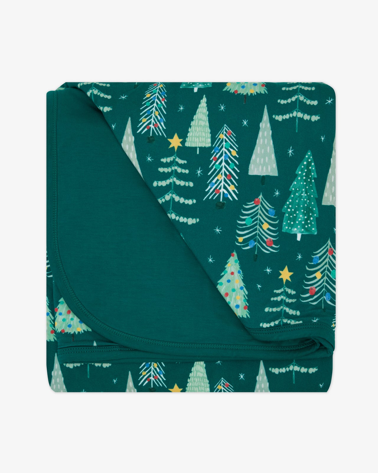 Flat lay of the Twinkling Trees Large Cloud Blanket®