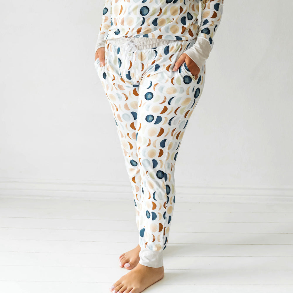 Close up image of a woman wearing Luna Neutral women's pajama pants