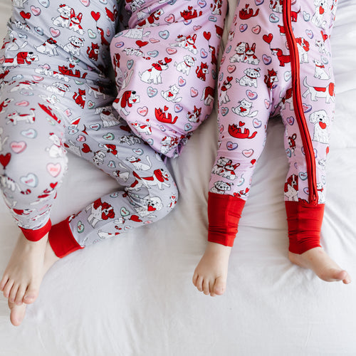 three children wearing matching furever valentines pajamas