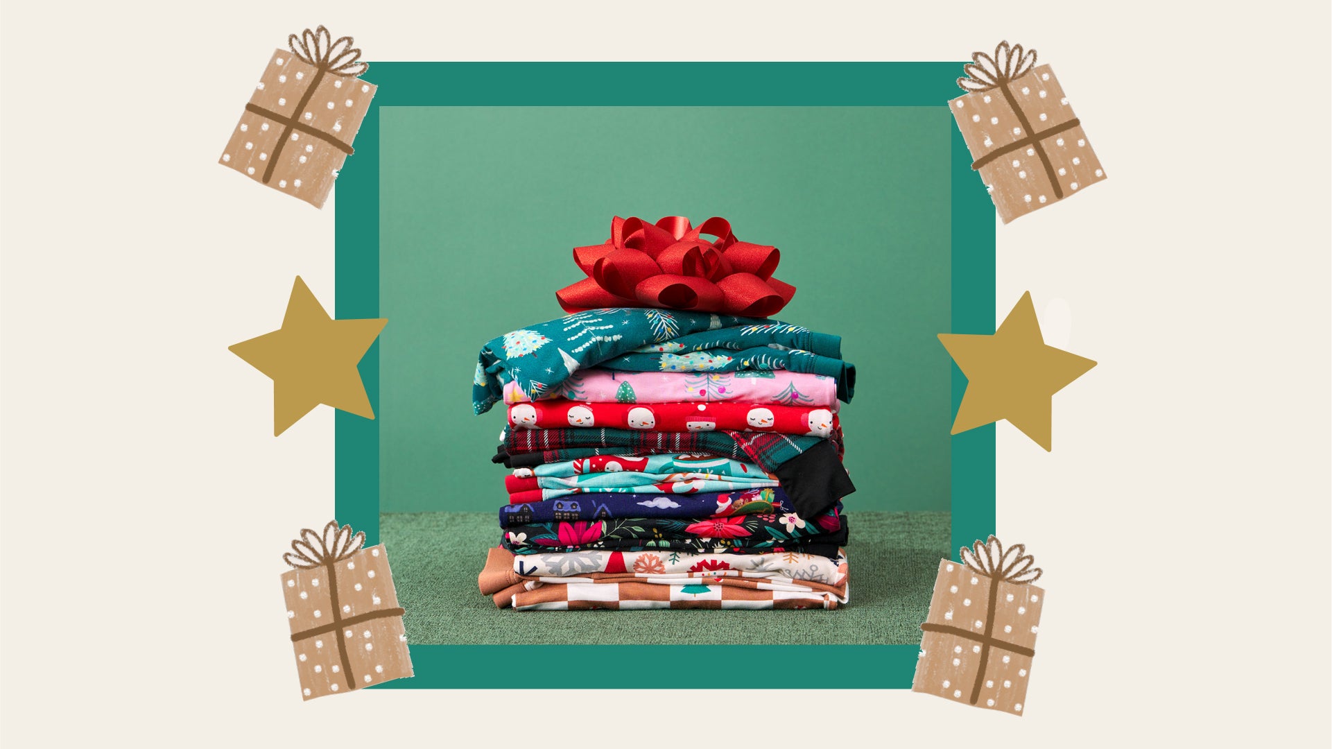 Image of Little Sleepies holiday pajamas folded and stacked with a bow on top