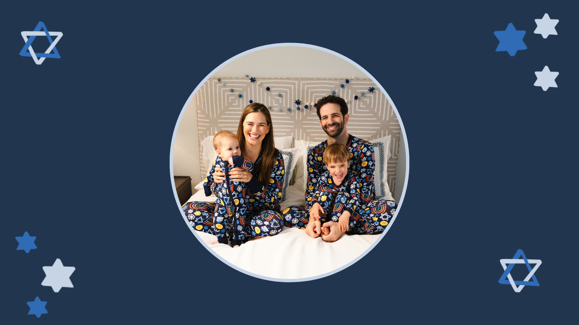 Image of a family wearing matching Playful Dreidels pajamas