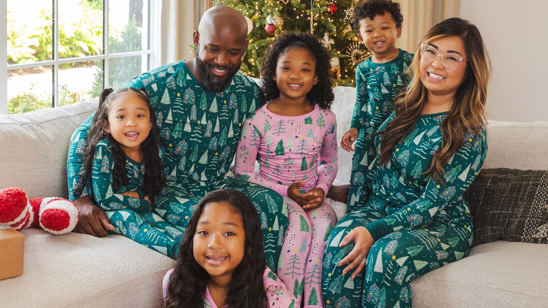 family of six in matching christmas pajamas