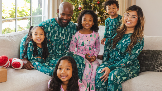 family of six wearing matching christmas pajamas