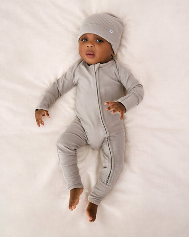 Baby boy wearing Dove Gray newborn clothing