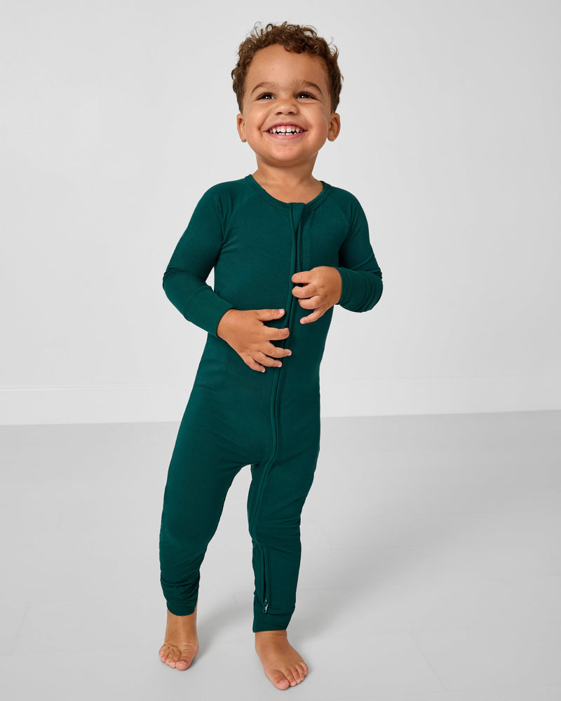 Toddler wearing Emerald green pajamas