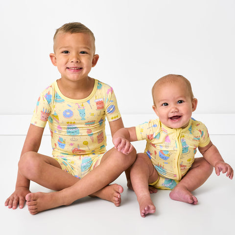Two children wearing matching Frosted Fun pjs