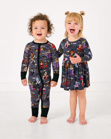Two children wearing matching Disney Villains styles 