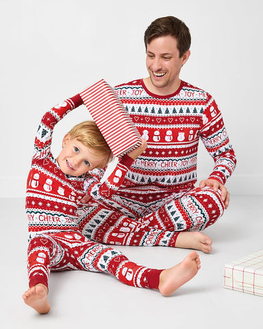 Fahter and son wearing matching festive fair isle holiday pajamas