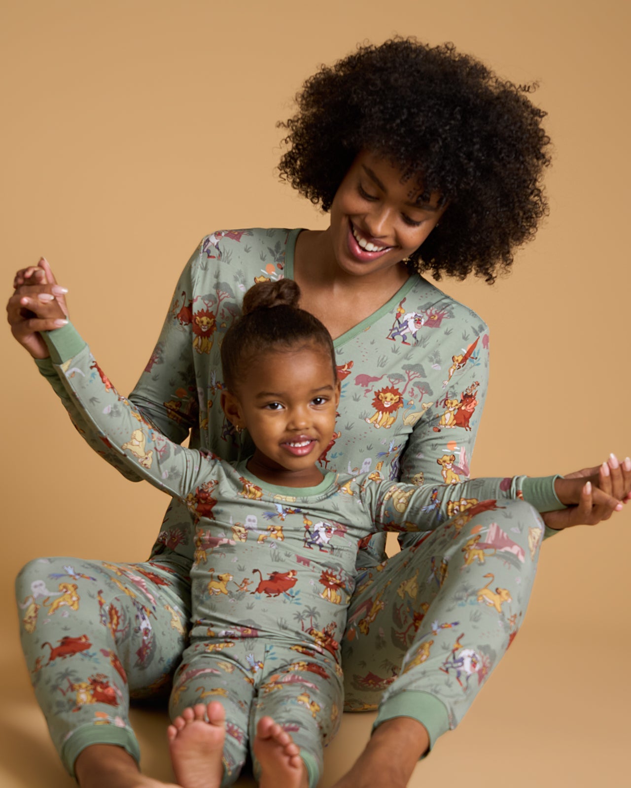 Mother and daughter wearing matching Simba's Safari PJs