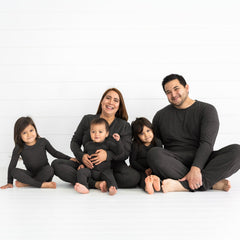 family of five wearing matching Heather Black Cozy pjs