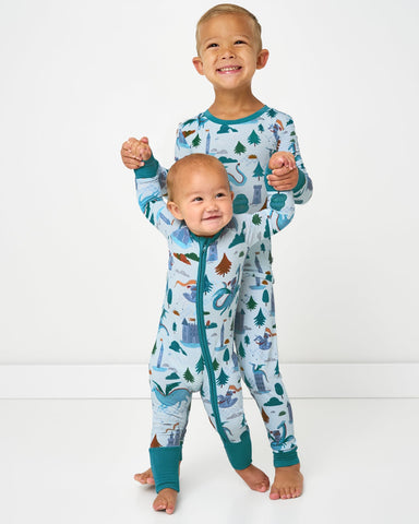 Two children wearing Knights Quest pajamas