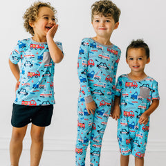 kids wearing To The Rescue pjs and daywear