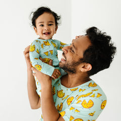 Father and Child wearing matching Pizza Pals pjs