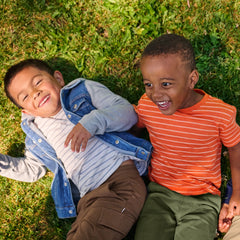 Children wearing various play tee shirts in stripes