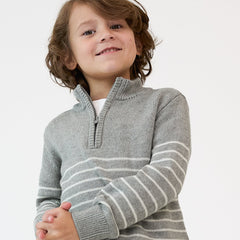 close up image of a child wearing a Gray Stripes sweater